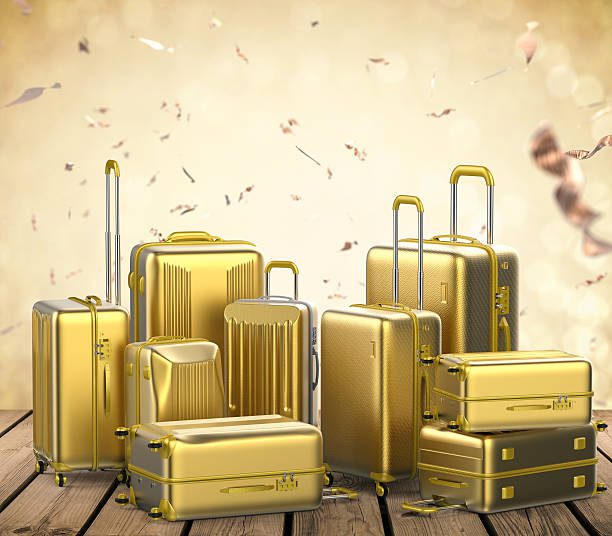 heap of gold luggages in various size